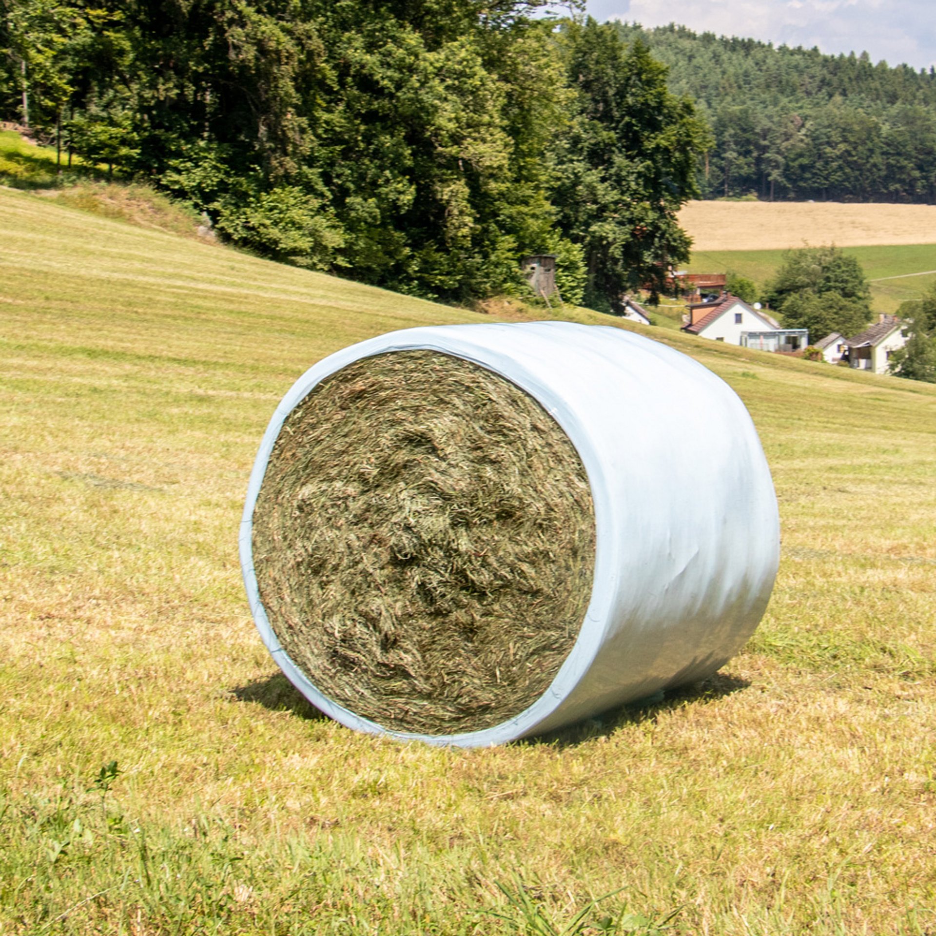 A wide film produces bales that are more compact and better protected by the film layers.