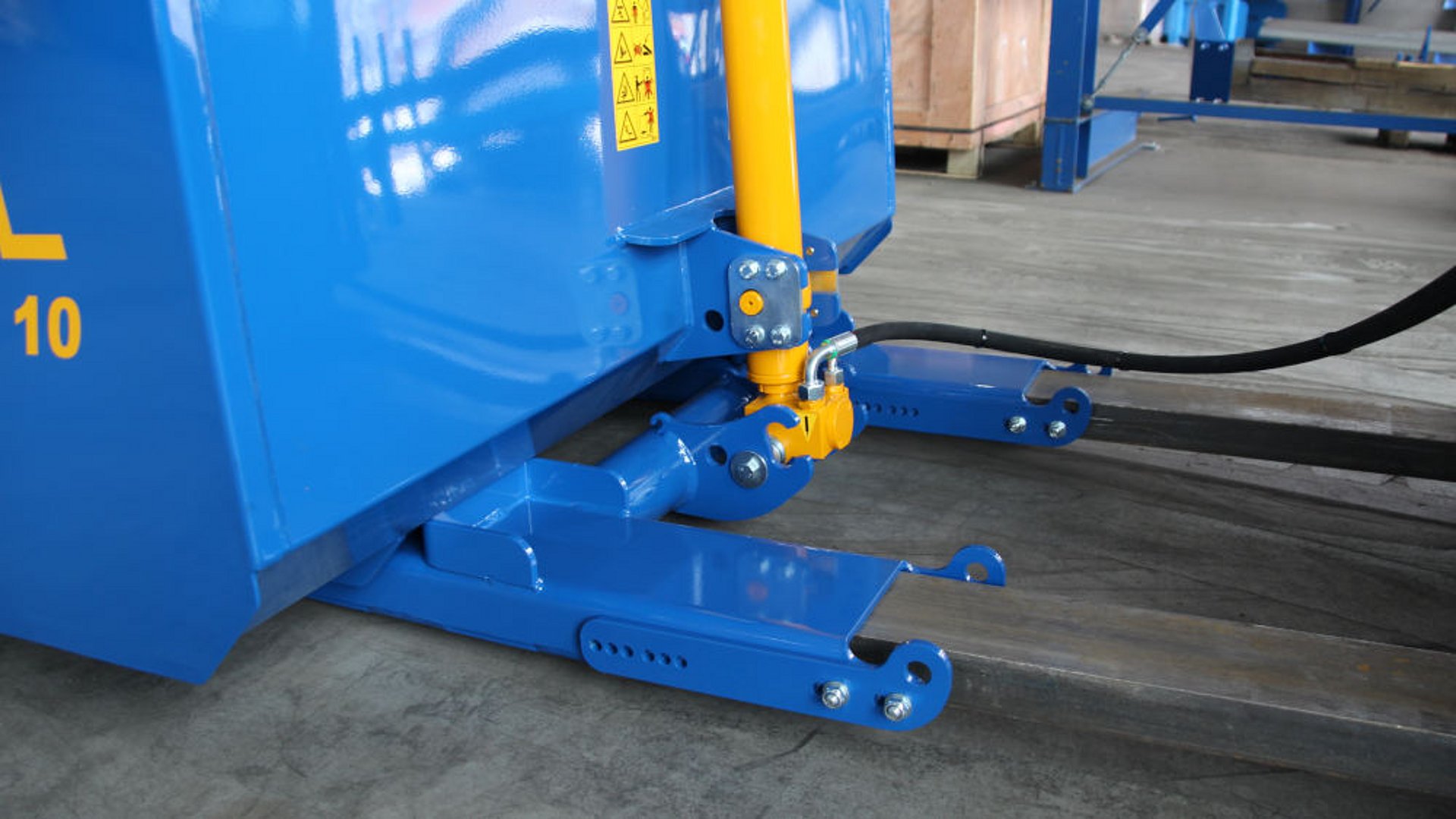 Our tried-and-true high lift bucket, with a forklift attachment that mounts conveniently over the forks.