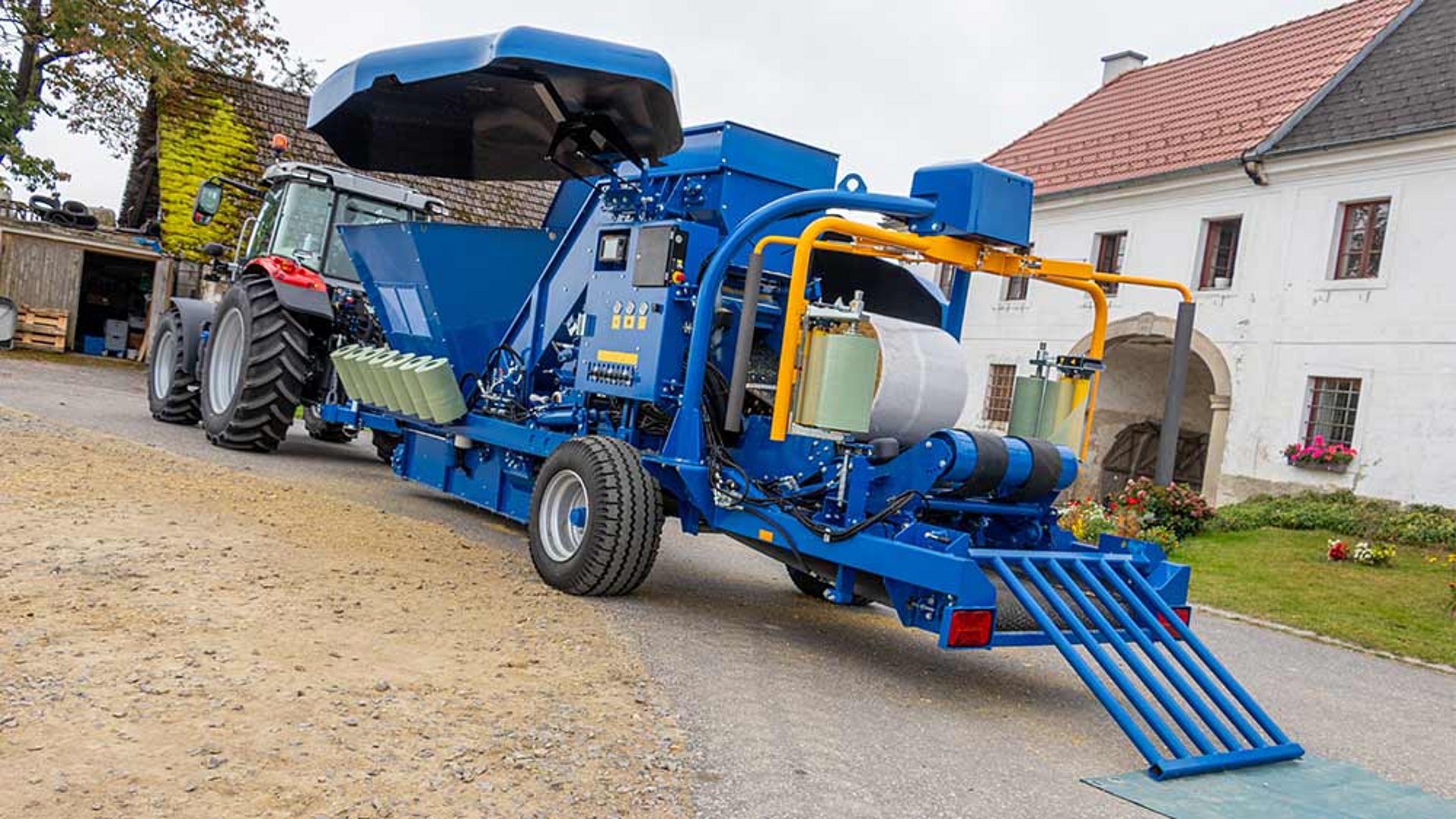 Mechanisch opklapbare losklep voor balen.