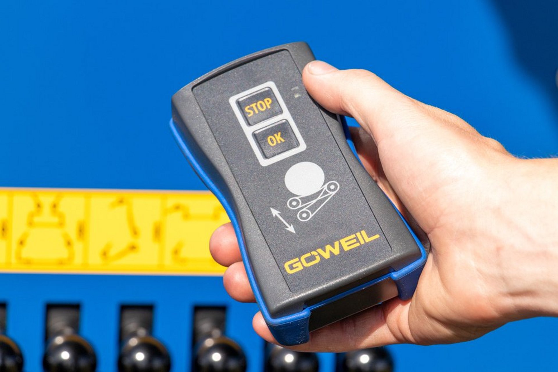 Handzender voor de balenafwerper