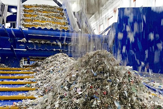 The material is loaded into the large capacity feeder