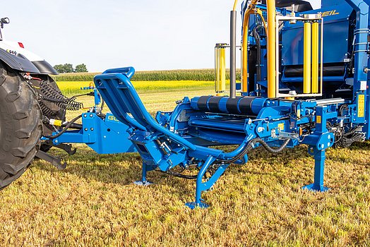 Fold down the bale delivery ramp