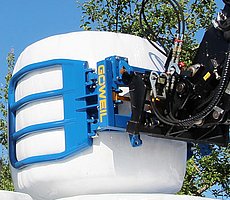 Die spezielle Form der Greifarme verhindert beim Stapeln eine Beschädigung des unteren Ballens.