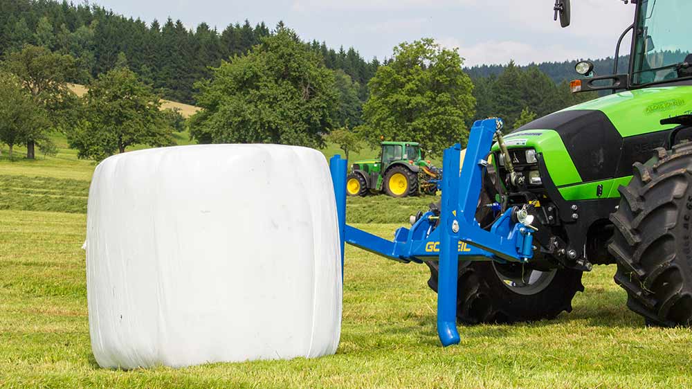 The bale is gently positioned on its front end.