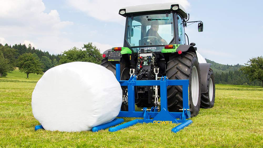 The first bale is loaded.