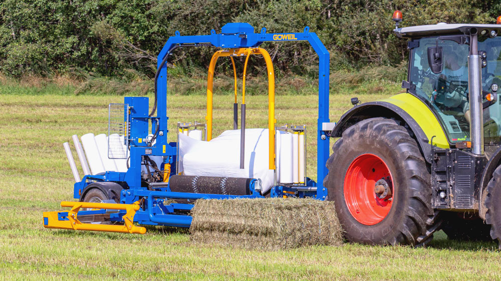The bale is picked up on the right in the direction of travel